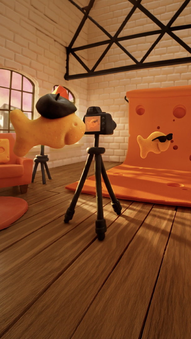 Goldfish cracker taking photos in a cheese-themed studio